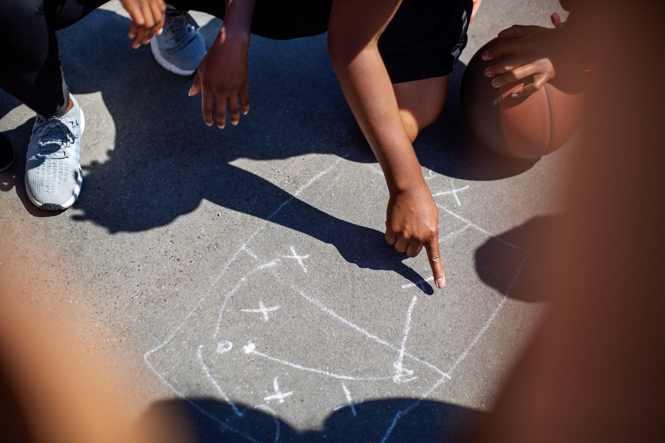 Basketball players making game plan tactics